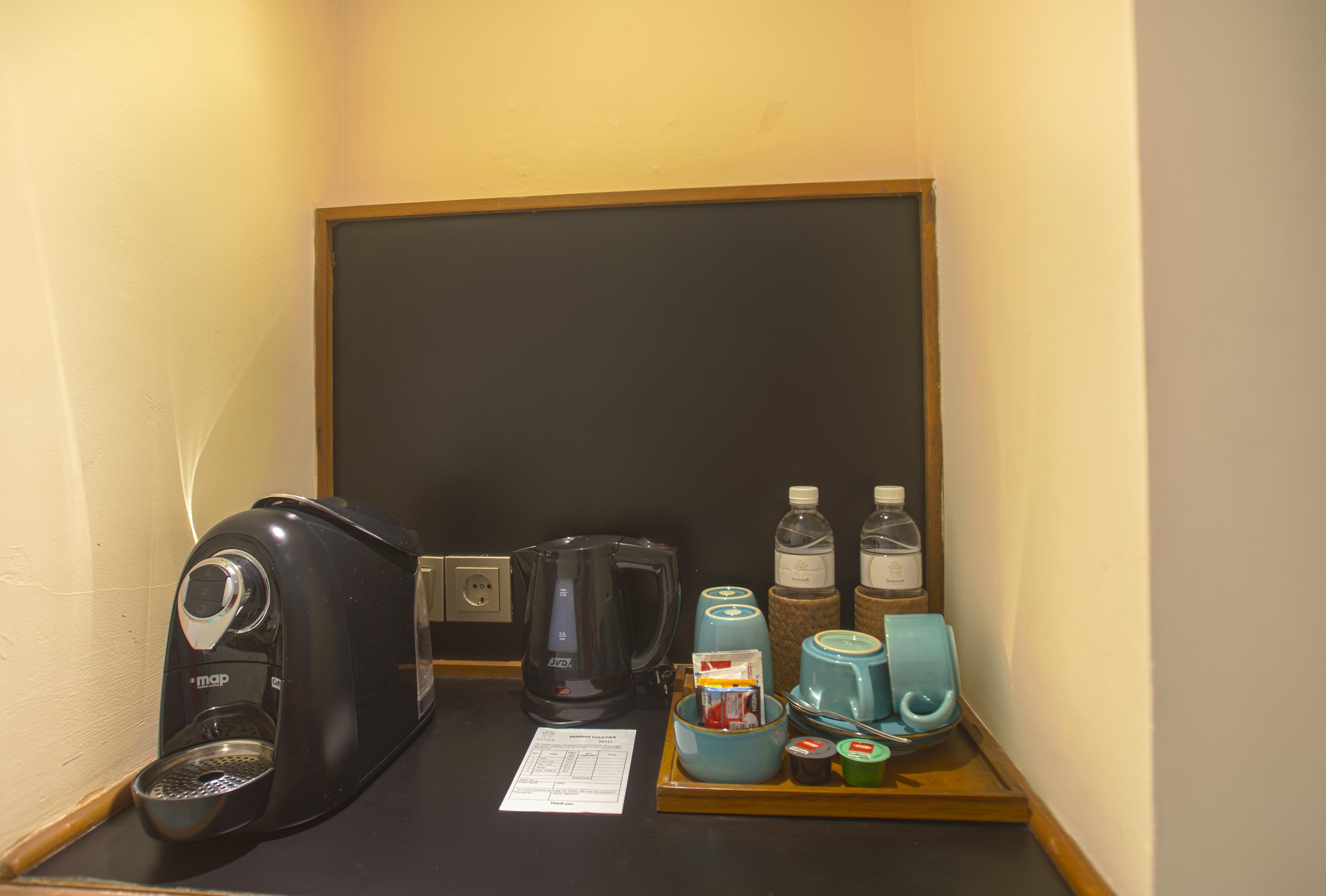 נוסא דואה Sadara Resort מראה חיצוני תמונה A Nespresso coffee machine in a hotel room